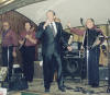 Former Bandleader Bill Chambers singing with the band.  Verne is directing the band.