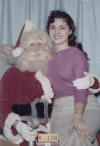 Judy Kutz; My Mom with Santa taken in the mid 50's before she was married and I was born.